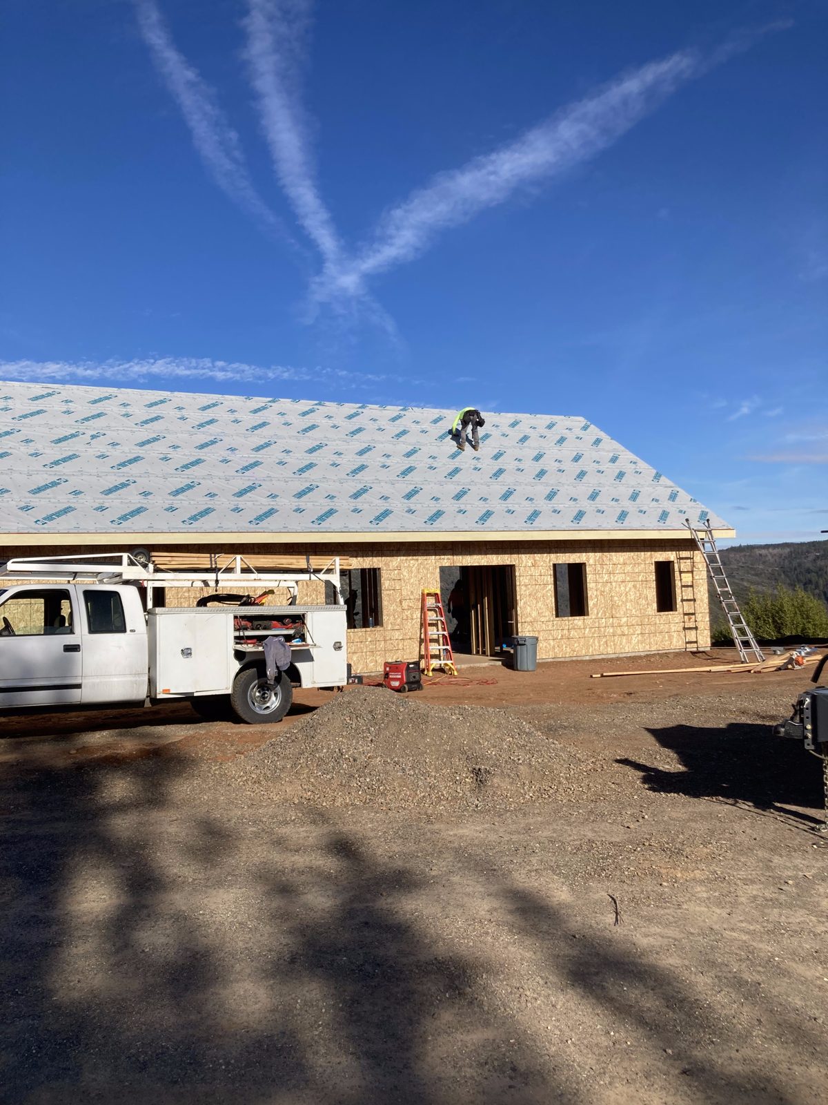 New roof underlayment installation on new construction home
